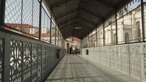 Tilt-Down-View-Along-Empty-Walkway-Of-Santa-Justa-Lift-In-Lisbon