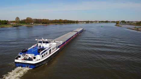 Aerial-View-Over-Sivali-Inland-Push-Tow-Ship-Along-Oude-Maas