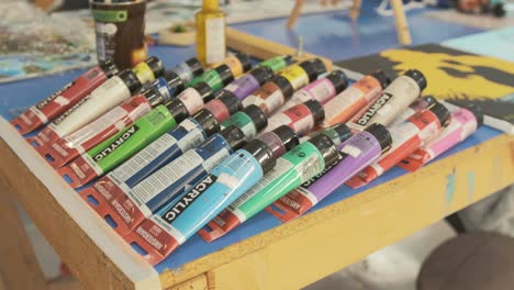 Assortment-of-acrylic-paints-in-artist's-studio