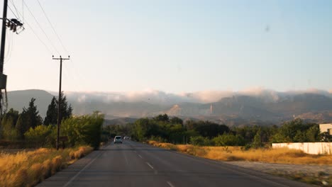 Static-shot-of-beautiful-mountains-and-sky-taken-from-the-windscreen-of-the-running-car