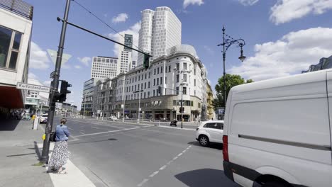 Woman-in-Skirt-Waiting-at-Traffic-Light-in-Berlin-to-Cross-the-Street