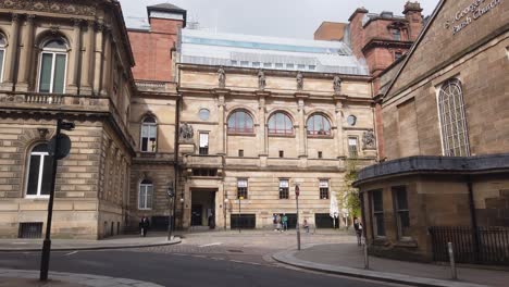 During-the-coronavirus-lockdown,-people-moving-about-in-a-quiet-Glasgow-city-centre