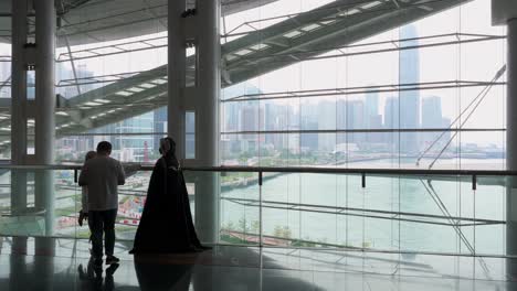 A-participant-dressed-up-as-a-cosplayer-is-seen-during-the-Anicom-and-Games-ACGHK-exhibition-event-in-Hong-Kong