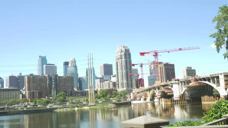 thriving-city-construction-streets-housing-buildings-downtown-skyline-business-economy-minneapolis-minnesota-america-aerial-drone