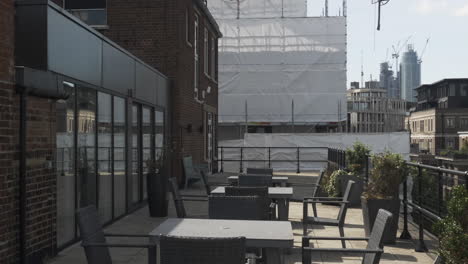 Modern-Rooftop-Terrace-With-Empty-Tables-And-Chairs-In-Westminster