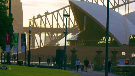 People-Strolling-At-Bennelong-Lawn-Park-In-Sydney-At-Dusk