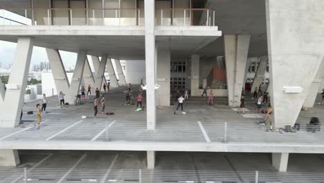 Social-distance-Tae-Bo-exercise-class-taught-in-empty-outdoor-parkade