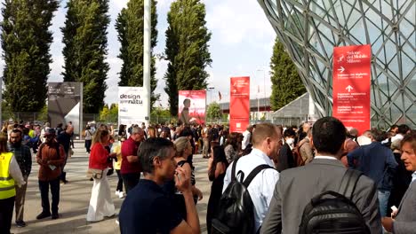 motion-lapse-of-crowd-waiting-and-entering-salone-del-mobile-main-gate