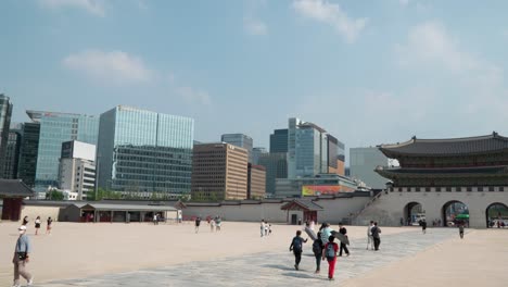 Korean-People-And-Tourists-Exploring-The-Iconic-Royal-Palace-Of-Gyeongbokgung-Amidst-Pandemic--Seoul-Cityscape-In-South-Korea