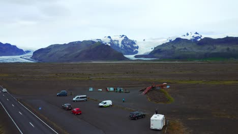 People-On-The-Remains-Of-Skeidara-Bridge-Destroyed-By-Volcanic-Heat-And-Glacial-Flood-In-Iceland