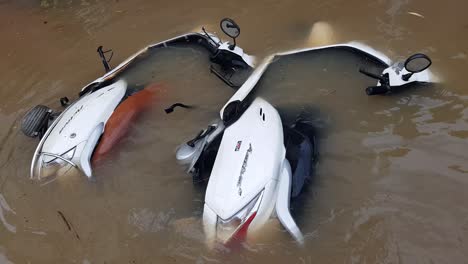 Two-Bikes-are-floating-in-the-floods-caused-by-heavy-rains-overnight-in-the-streets-of-Pondicherry