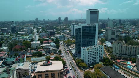 Victoria-Island-Lagos,-Nigeria---24-June-2021:-Drone-view-of-major-roads-and-traffic-in-Victoria-Island-Lagos-showing-the-cityscape,-offices-and-residential-buildings