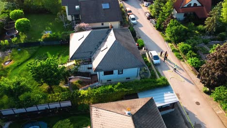 AERIAL---The-scene-of-a-fire-in-Oberwaltersdorf,-Austria,-wide-shot-circle-pan