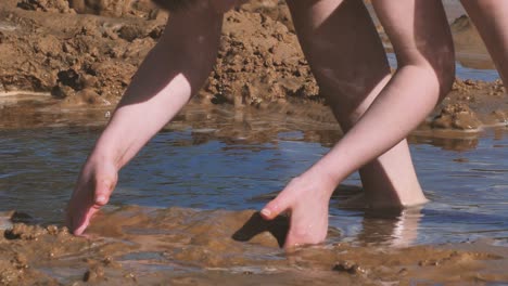 The-child-was-playing-with-wet-sand