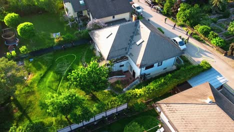 AERIAL---House-after-a-sofa-fire-in-Oberwaltersdorf,-Austria,-wide-shot