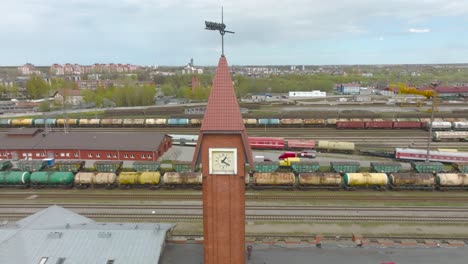 Train-station-tower-with-built-in-clock-and-lightning-rod-located-in-Klaipeda-city