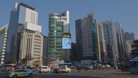 Glass-Tower,-Iz-Tower,-Medi-Tower-in-Seoul-downtown-on-sunny-day,-Gangnam-station-crossroad-in-rush-hour