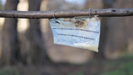 Paper-warning-sign-in-Czech-language-that-these-are-private-properties-and-the-entrance-is-forbidden