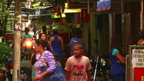 Electrical-wires,-laundry-lines-and-tree-vines-tangled-above-the-street-in-the-unplanned-infrastructure-of-the-favela-in-rio-de-Janeiro,-Brazil