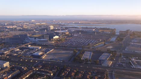 Aerial-View-Of-Oakland-Coliseum-Garage-And-RingCentral-Coliseum-In-Oakland,-California,-USA-On-A-Sunny-Morning