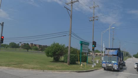 Traveling-in-the-Chicago-Illinois-area,-suburbs,-streets,-and-highways-in-POV-mode-at-red-light-on-Glenwood-rd