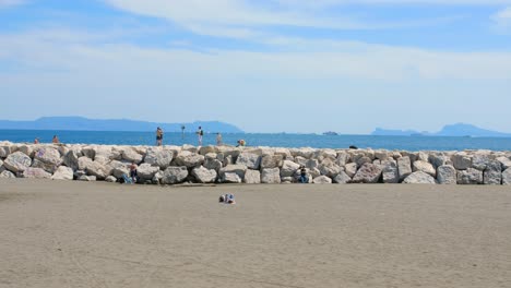 Overlooking-coastline-and-sea-from-Mappatella-beach-with-rocky-coastline-in-Naples,-Italy