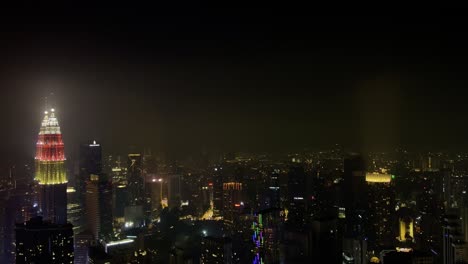 Aerial-view-of-the-Petronas-Twin-Towers-or-KLCC-Twin-Towers-and-other-supertall-skyscrapers-in-Kuala-Lumpur-Malaysia