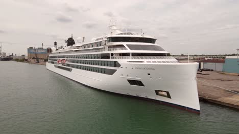 Norwegian-Cruise-Ship,-Viking-Octantis,-docked-in-Detroit-MIchigan,-aerial-front-view