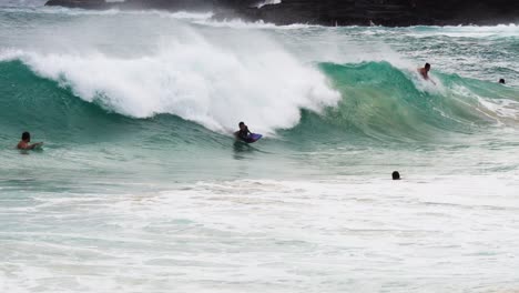 Slow-motion-bodyboarder-takes-drop-and-attempts-360-on-large-shorebreak