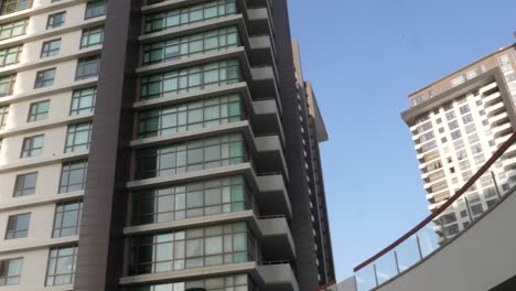 Looking-Up-With-Slow-Pan-Left-View-Across-Balcony-With-View-Of-Emaar-Residential-Apartments-In-Karachi