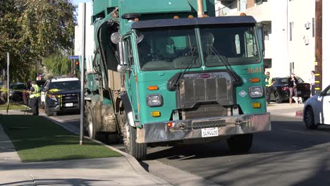 garbage-truck-parked-on-road