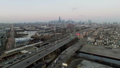 Aerial-view-over-the-Stevenson-Expy,-towards-downtown-Chicago,-springtime-in-USA