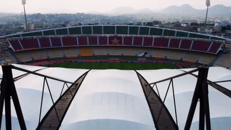 Aerial-view-in-front-of-the-Stade-Omnisports-Ahmadou-Ahidjo-stadium,-in-Yaounde,-Cameroon