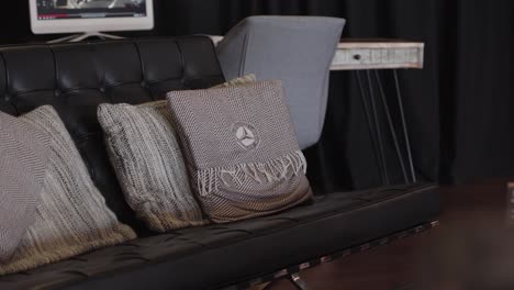 Black-sofa-in-a-car-dealership