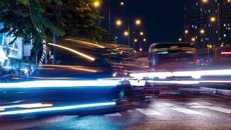 Saigon---Night,-street-view-Time-Lapse-of-heavy-traffic-moving-fast-at-Traffic-lights---Vietnam,-Ho-Chi-Minh-City