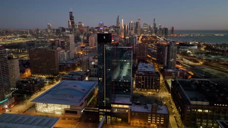 Aerial-view-around-the-Marriott-Marquis-Chicago-hotel,-dusk-in-Illinois,-USA