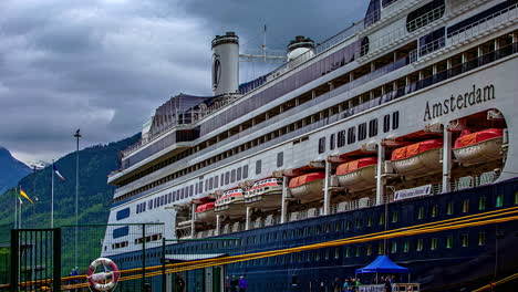 Timelapse-of-embarking-the-giant-cruise-ship-Amsterdam-in-Norway-on-a-cloudy-day