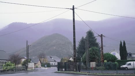 Panning-across-a-street-in-a-French-community-village-in-the-Pyrenees-Mountains