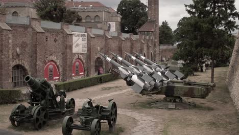 Tourists-viewing-missile-launcher-in-Belgrade,-Serbia