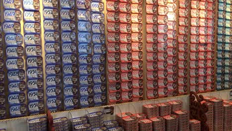 O-Mundo-Fantástico-da-Sardinha-Portuguesa-store-with-several-types-of-canned-seafood-in-Porto,-Portugal