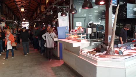 People-Enjoying-Tapas-At-Mercado-De-San-Miguel