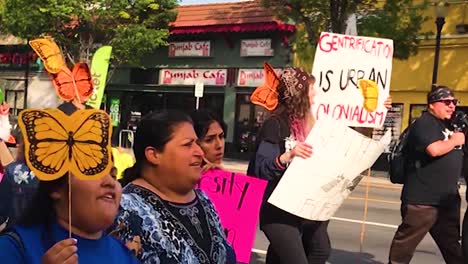 A-diverse-group-of-people-marches-in-support-of-equal-rights-for-immigrants-during-a-rally-in-San-Jose,-California