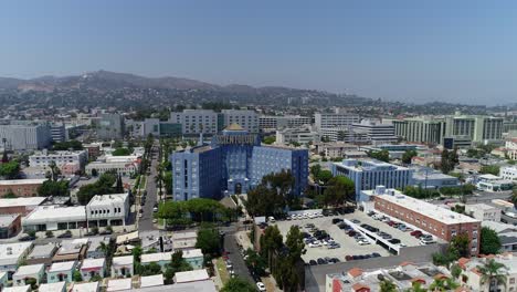 4k-Drone-aerial-push-in-shot-of-the-Church-of-Scientology-building-and-campus-on-Sunset-Blvd-in-Los-Angeles-California