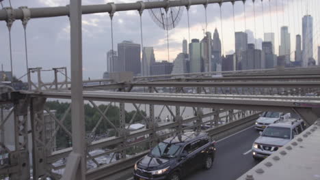 Cars-Crossing-The-Brooklyn-Bridge-With-Manhattan-in-the-Background