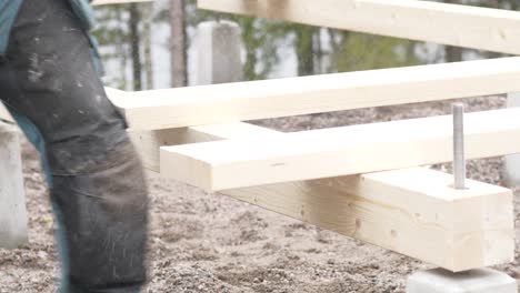 Handyman-Using-Hand-Held-Circular-Saw-Machine-Outdoors