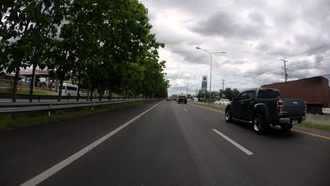 This-is-a-time-lapse-with-an-action-camera-mounted-in-front-of-the-truck,-driving-from-Pranburi-to-Hua-Hin-and-Hua-Hin-to-Bangkok-on-Phet-Kasem-Road