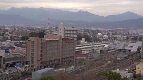 Tokyo,-Japan---A-Fantastic-Travel-Experience-With-Shinkansen-Passing-Through-Concrete-Stations---Steady-Shot