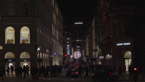 Christmas-lights-and-crowds-down-a-street-in-Hamburg-next-to-a-Christmas-market-in-Dec-2019