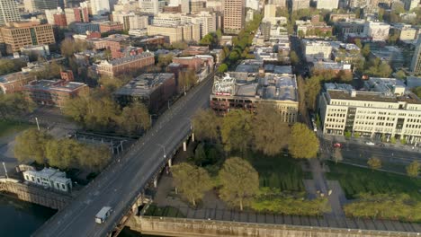 Historic-aerial-of-Portland,-Oregon's-iconic-Old-Town-sign-with-empty-streets-due-to-COVID-19