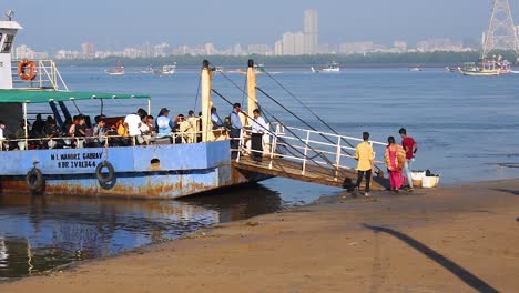 Last-Passengers-or-people-running-in-ferry-boat-or-ro-ro-ferry-to-go-on-other-port-video-background-with-beautiful-landscape-and-bay